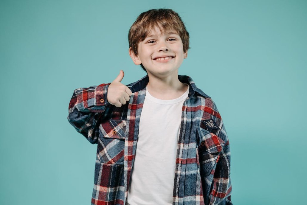thumbs up from elementary school student