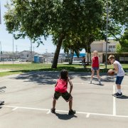 Kids playing pickup basketball
