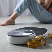 Eating,Disorder.,Sad,Woman,Sitting,Near,Scale,And,Measuring,Tape