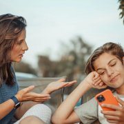 Mom and son with phone