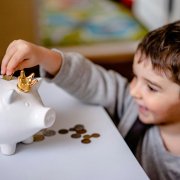 Boy with piggy bank