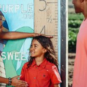 Parent measuring childs growth
