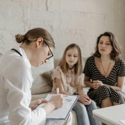 Child talking with therapist