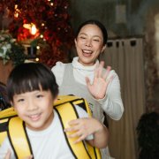 Parent sending child off to school