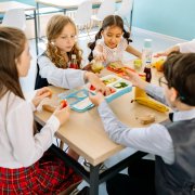 Kids eating lunch in cafeteria