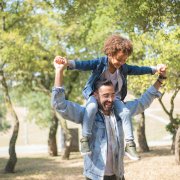 Son on fathers shoulders