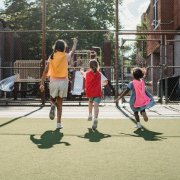 Stock Kids Running on Playground