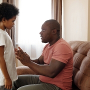 AA parent giving advice to child